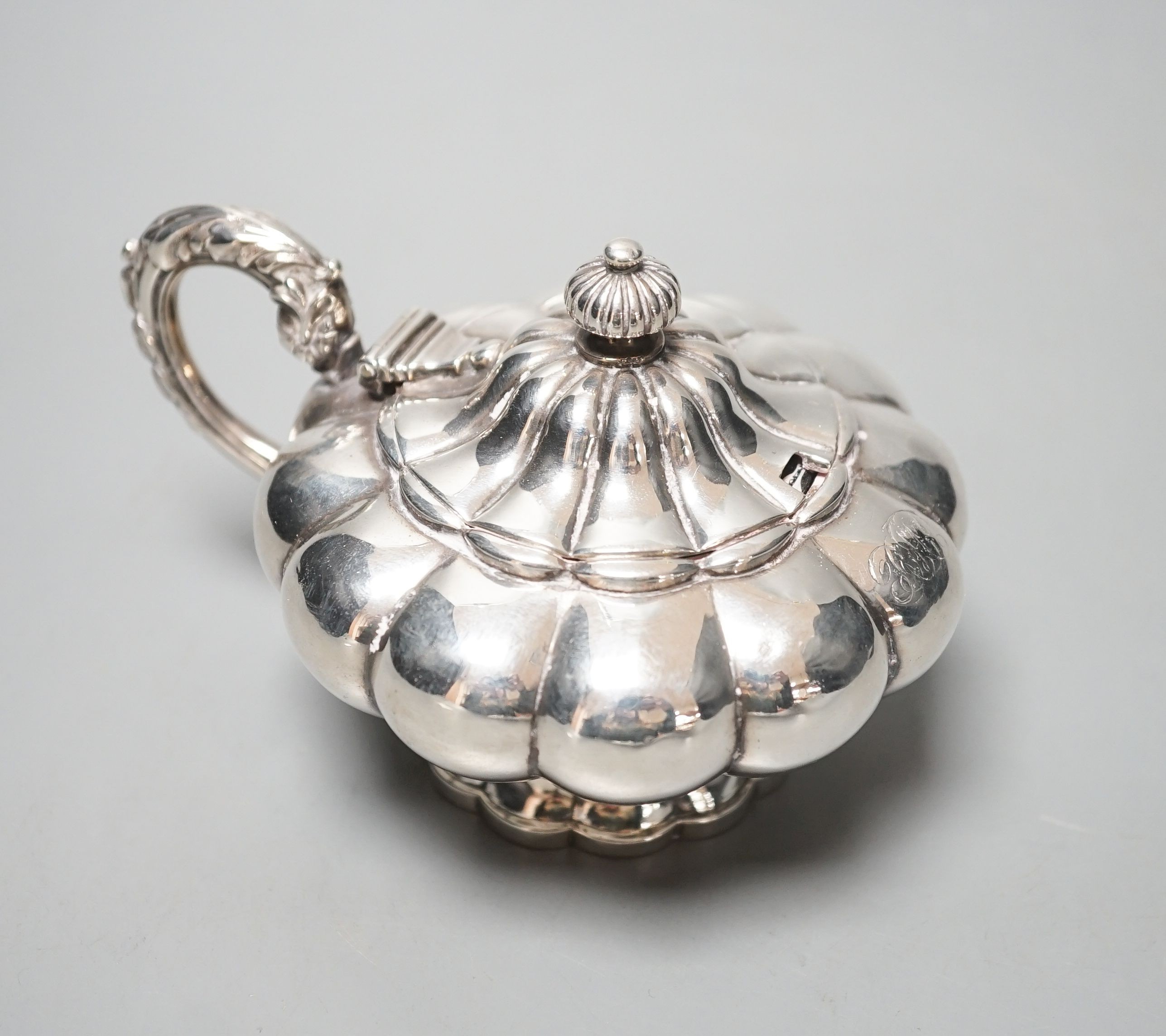 A George IV silver melon shape mustard pot, maker's, John & Thomas Cutmore?, London, 1828, height 74mm.